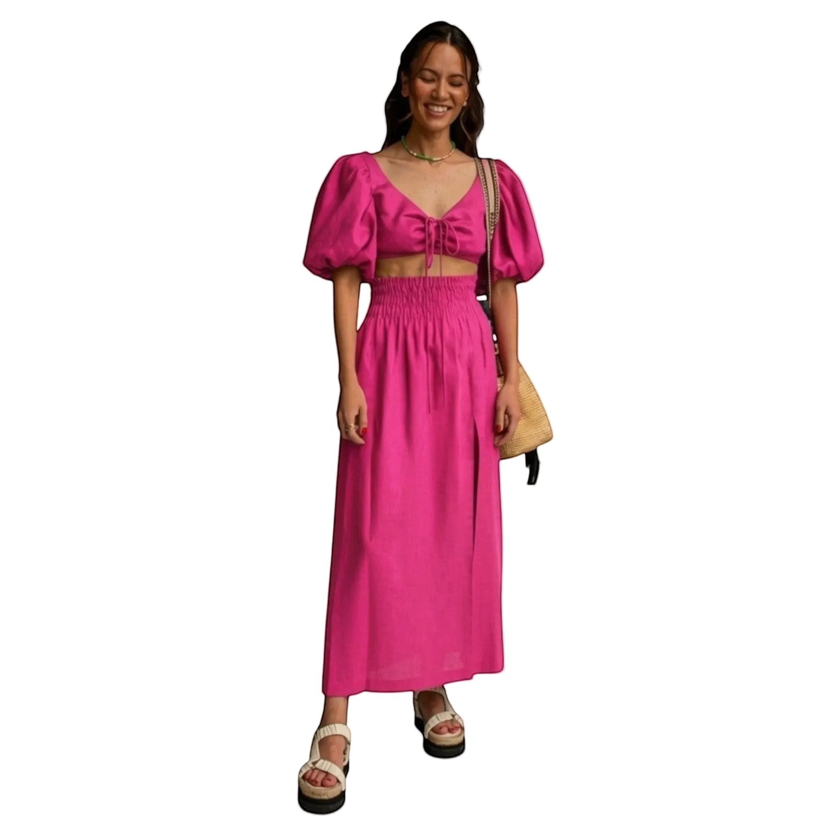 Falda maxi fucsia de REVES con cintura alta elástica y abertura frontal. Tejido ligero.