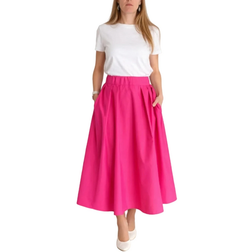 Falda Siberia Fucsia de REVES. Falda larga de color fucsia con cintura elástica y bolsillos laterales.